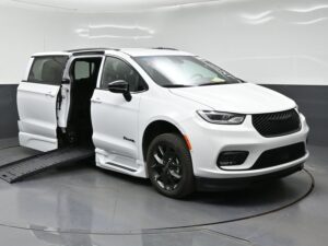 White Chrysler Pacifica with BraunAbility Side Entry Automatic Fold Out conversion