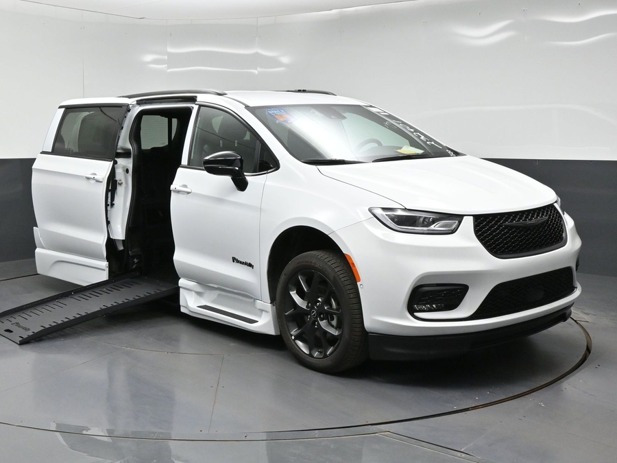 White Chrysler Pacifica with BraunAbility Side Entry Automatic Fold Out conversion