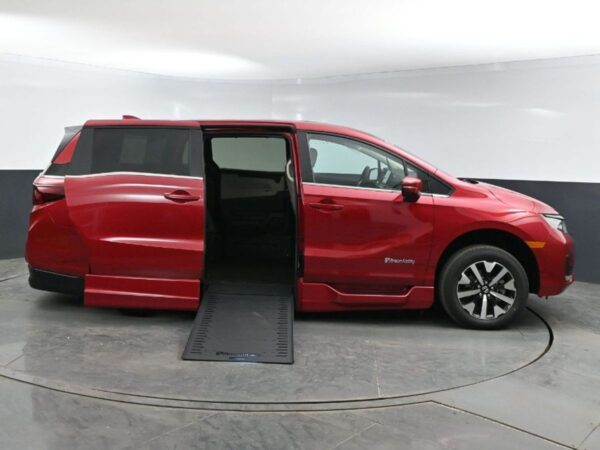Red Honda Odyssey with BraunAbility Side Entry Automatic In Floor conversion