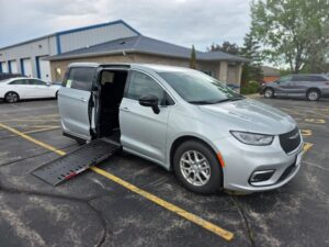 Silver Chrysler Pacifica with Driverge Side Entry Automatic Fold Out conversion