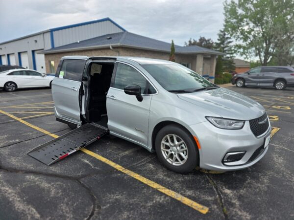 Silver Chrysler Pacifica with Driverge Side Entry Automatic Fold Out conversion