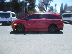 Red Honda Odyssey with Vantage Mobility Side Entry Automatic In Floor conversion
