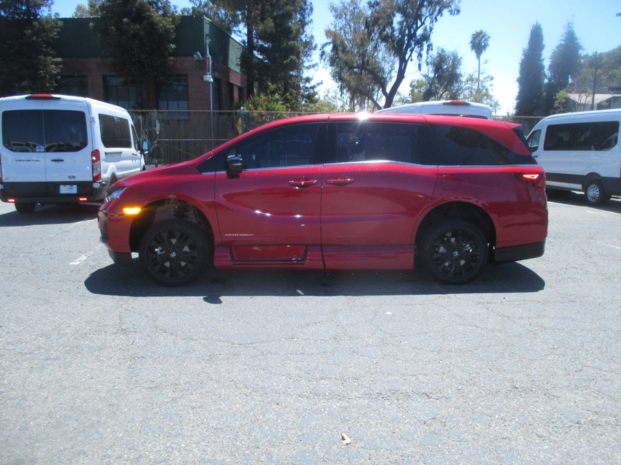 Red Honda Odyssey with Vantage Mobility Side Entry Automatic In Floor conversion