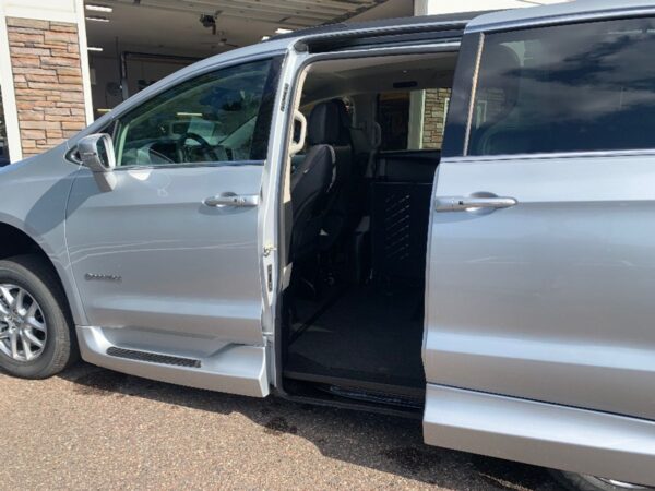 Silver Chrysler Pacifica with Driverge Side Entry Automatic Fold Out conversion