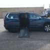 Blue Chevrolet Traverse with BraunAbility Side Entry Automatic In Floor conversion