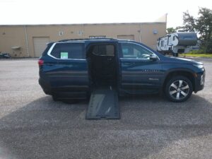 Blue Chevrolet Traverse with BraunAbility Side Entry Automatic In Floor conversion