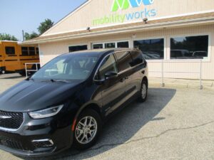 Black Chrysler Voyager with Driverge Side Entry Automatic Fold Out conversion