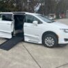 White Chrysler Pacifica with BraunAbility Side Entry Automatic Fold Out conversion