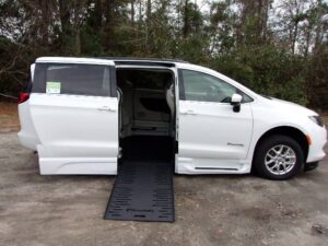 White Chrysler Voyager with BraunAbility Side Entry Automatic Fold Out conversion