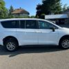 White Chrysler Voyager with FR Conversions Rear Entry Manual Fold Out conversion