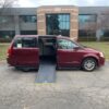 Red Dodge Grand Caravan with Driverge Side Entry Automatic Fold Out conversion