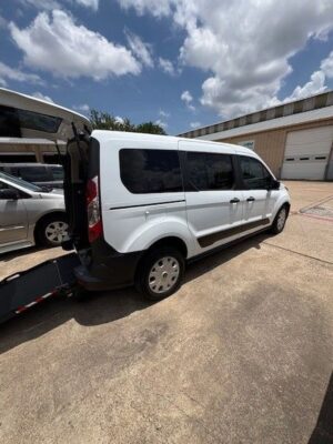 White Ford Transit Connect with Driverge Rear Entry Manual Fold Out conversion