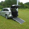 Silver Toyota Sienna with Driverge Rear Entry Manual Fold Out conversion