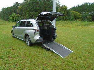 Silver Toyota Sienna with Driverge Rear Entry Manual Fold Out conversion