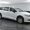 White Chrysler Voyager with BraunAbility Rear Entry Manual Fold Out conversion