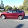 Red Chrysler Voyager with BraunAbility Side Entry Automatic Fold Out conversion