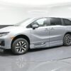 Silver Honda Odyssey with BraunAbility Side Entry Automatic In Floor conversion