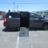 Grey Dodge Grand Caravan with Adaptive Vans Side Entry Automatic Fold Out conversion