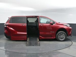 Red Toyota Sienna with BraunAbility Side Entry Automatic Fold Out conversion