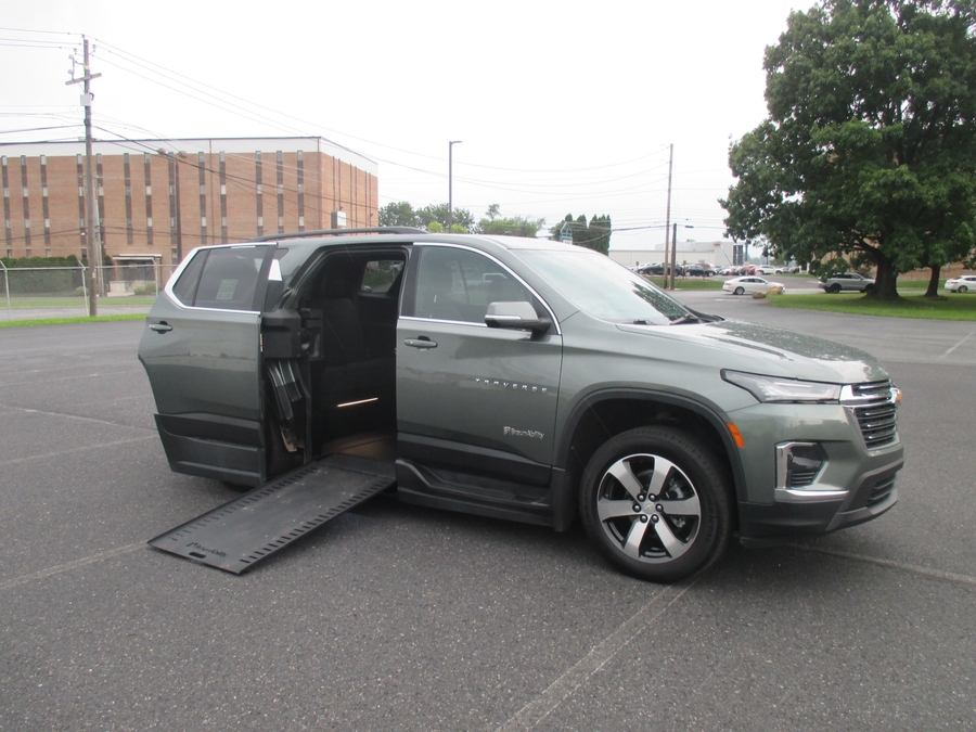 Silver Chevrolet Traverse with BraunAbility Side Entry Automatic In Floor conversion