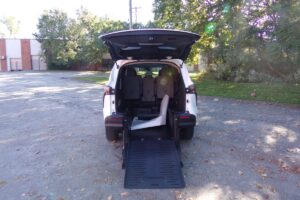 White Toyota Sienna with BraunAbility Rear Entry Manual Fold Out conversion