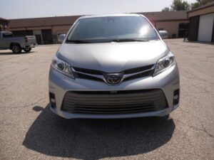 Silver Toyota Sienna with BraunAbility Side Entry Automatic Fold Out conversion