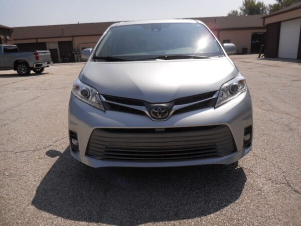 Silver Toyota Sienna with BraunAbility Side Entry Automatic Fold Out conversion