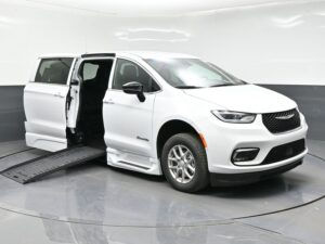 White Chrysler Pacifica with BraunAbility Side Entry Automatic Fold Out conversion