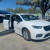 White Chrysler Pacifica with BraunAbility Side Entry Automatic Fold Out conversion