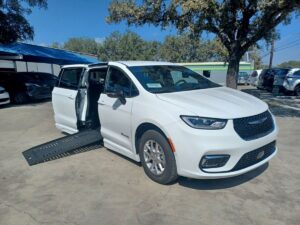 White Chrysler Pacifica with BraunAbility Side Entry Automatic Fold Out conversion