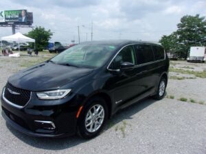 Black Chrysler Pacifica with Driverge Side Entry Automatic Fold Out conversion