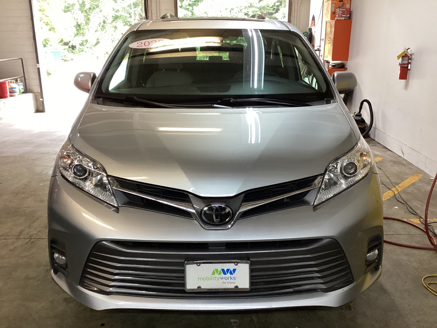 Silver Toyota Sienna with BraunAbility Side Entry Automatic Fold Out conversion