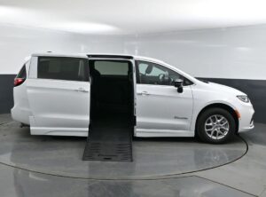 White Chrysler Pacifica with BraunAbility Side Entry Automatic Fold Out conversion