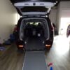 Black Chrysler Pacifica with Driverge Rear Entry Manual Fold Out conversion