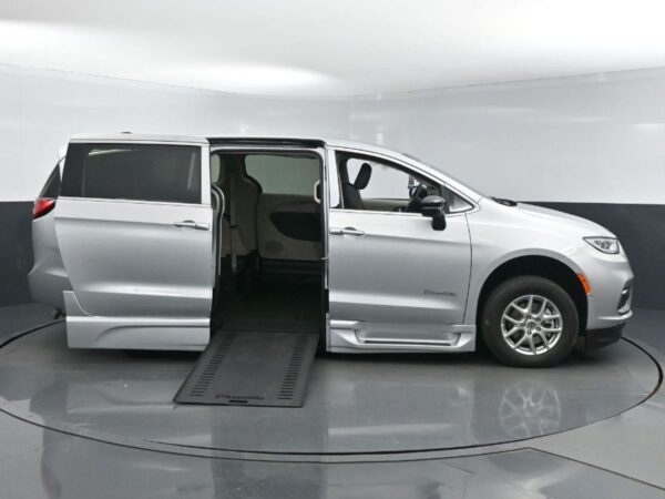 Silver Chrysler Pacifica with BraunAbility Side Entry Automatic In Floor conversion