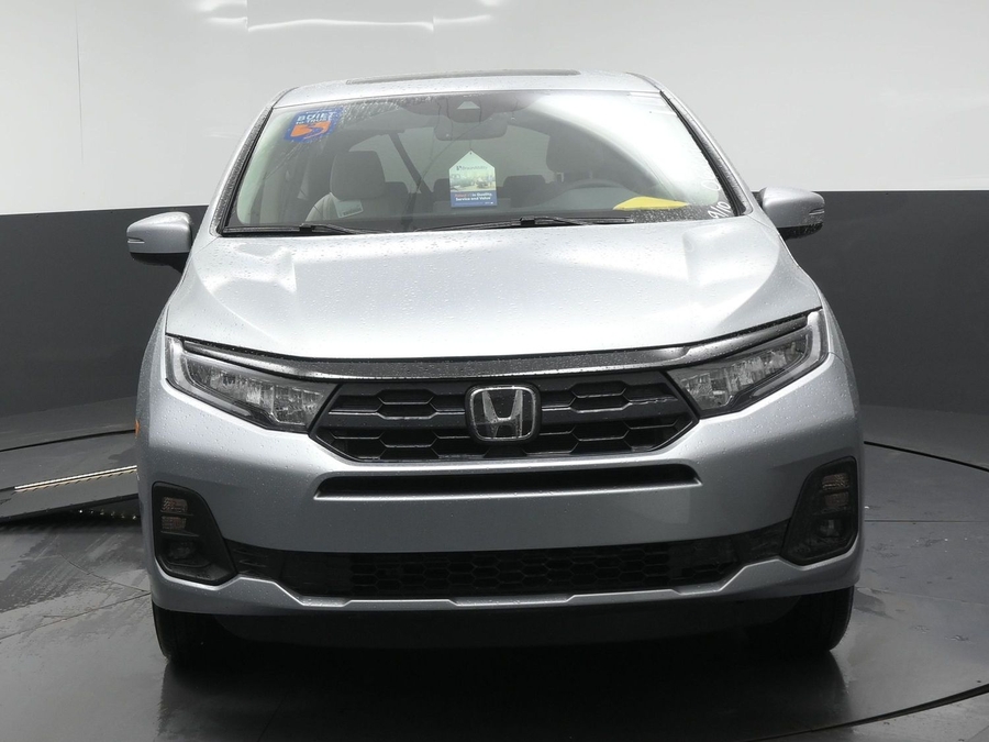 Silver Honda Odyssey with BraunAbility Side Entry Automatic In Floor conversion