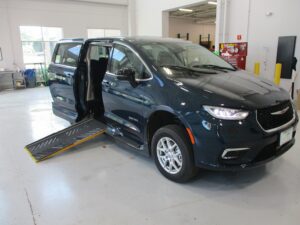 Blue Chrysler Pacifica with Driverge Side Entry Automatic Fold Out conversion