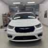 White Chrysler Pacifica with Vantage Mobility Side Entry Automatic In Floor conversion
