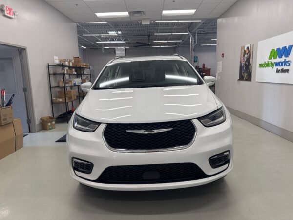 White Chrysler Pacifica with Vantage Mobility Side Entry Automatic In Floor conversion
