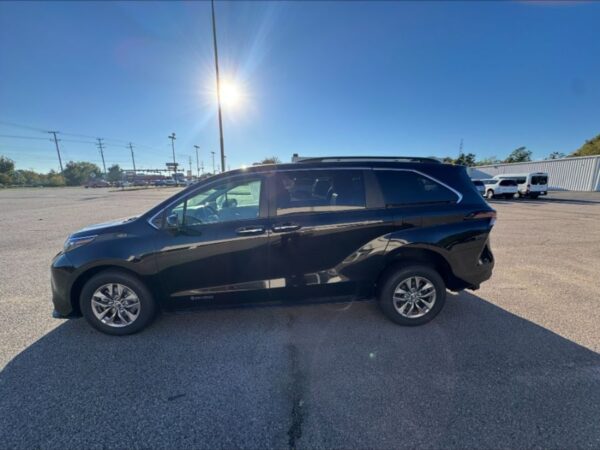 Black Toyota Sienna with Driverge Rear Entry Manual Fold Out conversion