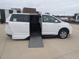 White Toyota Sienna with BraunAbility Side Entry Automatic Fold Out conversion