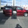 Red Chrysler Voyager with BraunAbility Side Entry Automatic Fold Out conversion