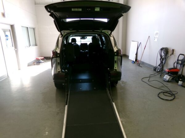 Silver Toyota Sienna with Driverge Rear Entry Manual Fold Out conversion