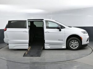 White Chrysler Pacifica with BraunAbility Side Entry Automatic Fold Out conversion