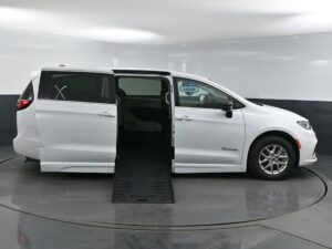 White Chrysler Pacifica with BraunAbility Side Entry Automatic Fold Out conversion