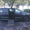 Black Chrysler Pacifica with Driverge Side Entry Automatic Fold Out conversion