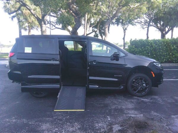 Black Chrysler Pacifica with Driverge Side Entry Automatic Fold Out conversion