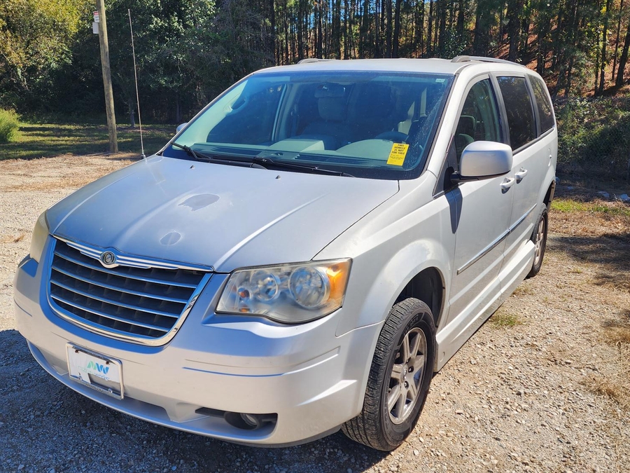 Silver Chrysler Town and Country with Vantage Mobility Side Entry Automatic In Floor conversion