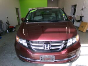 Red Honda Odyssey with Vantage Mobility Side Entry Automatic In Floor conversion