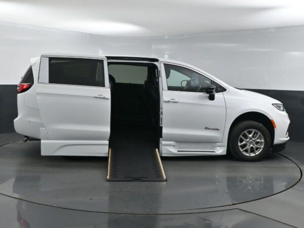 White Chrysler Pacifica with BraunAbility Side Entry Automatic In Floor conversion